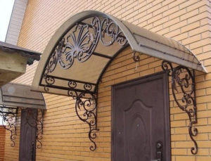 Кованые козыррьки на заказ в Херсоне